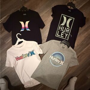 Hurley multiple color set of 4 Tee shirts NWOT